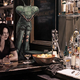 Illustration for article titled Concept Art Writing Prompt: Sitting at the Bar with a Giant Praying Mantis